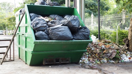 Residential area in Finchley with a skip placed for waste disposal